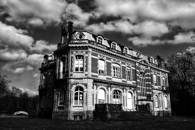 Low angle view of old building against sky