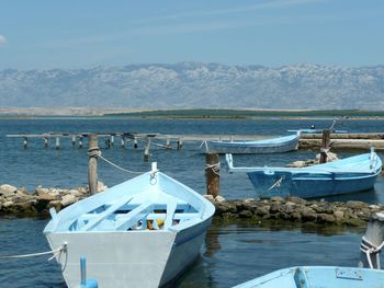 High angle view of boats moored at sea