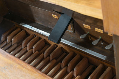 High angle view of piano on table