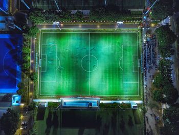 High angle view of soccer field at night