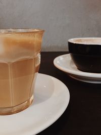 Close-up of coffee cup on table