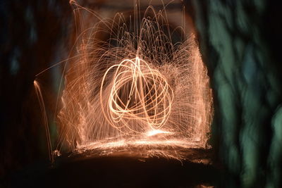 Close-up of illuminated light trails at night