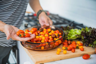 Man preparing food on cutting board