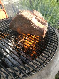 Close-up of meat on barbecue grill