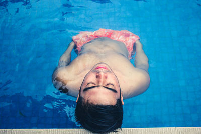 High angle view of man swimming in pool