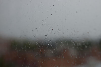 Close-up of water drops on glass