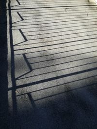 High angle view of shadow on floor