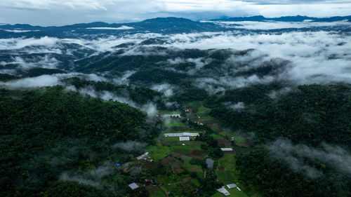 Aerial view of townscape against sky