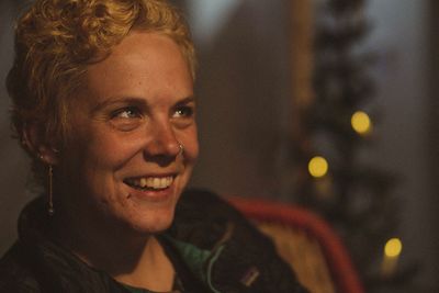 Close-up portrait of smiling young woman