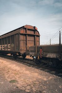 Train on railroad track against sky