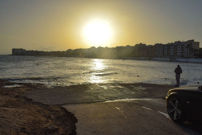 Scenic view of sea against sky during sunset