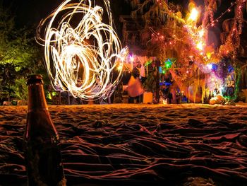 View of illuminated people at night