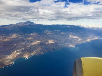 Aerial view of mountain against sky