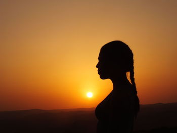 Silhouette of man at sunset