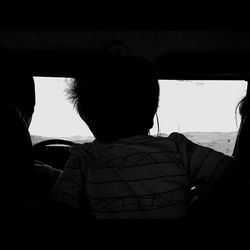 View of woman in car