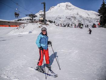 Woman skiing on snowcapped mount hood