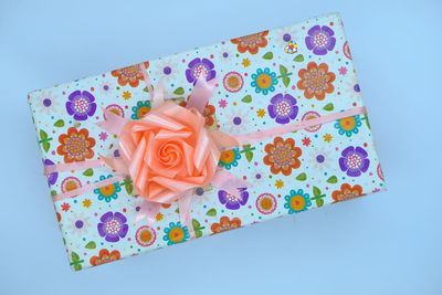 Close-up of roses against blue background