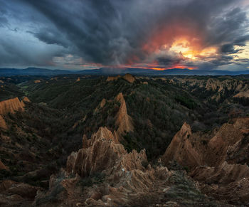 Scenic view of landscape against sky during sunset