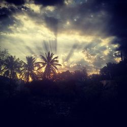 Scenic view of landscape against cloudy sky