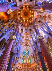 Low angle view of illuminated ceiling of building