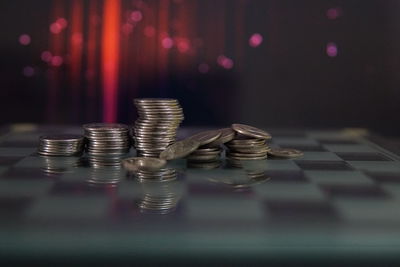 Close-up of coins on table