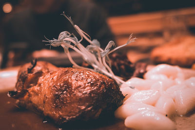 Close-up of meat in plate on table