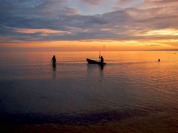 Scenic view of sea against sky during sunset