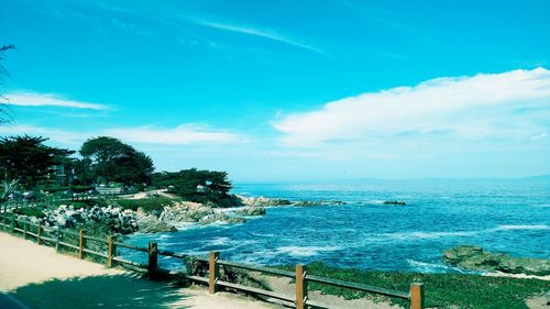 Scenic view of sea against cloudy sky