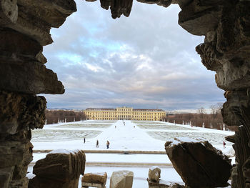 View of historic buildings against sky during winter