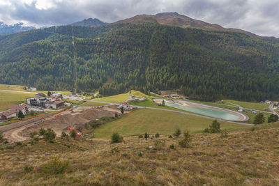 Small alpine church and small artificial lake in vallelunga, alto adige, italy
