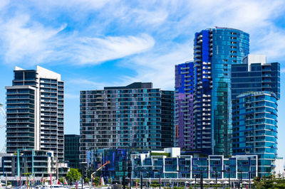 Modern buildings against blue sky