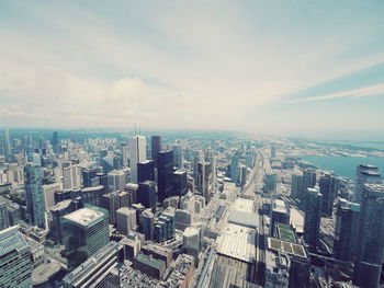 High angle view of buildings in city against sky