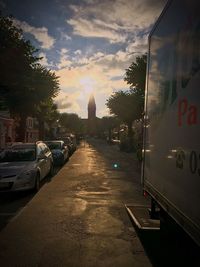 Cars on road against sky