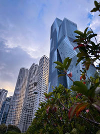 Low angle view of modern buildings against sky