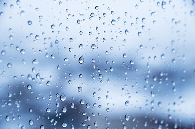 Rain drops on window glasses texture background