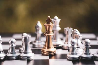 Close-up of chess pieces on board