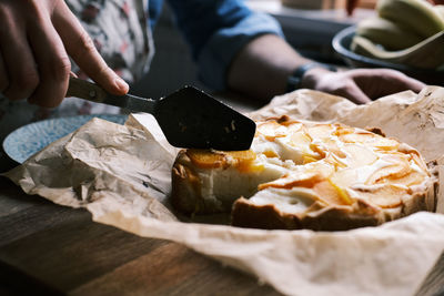 Midsection of man preparing food