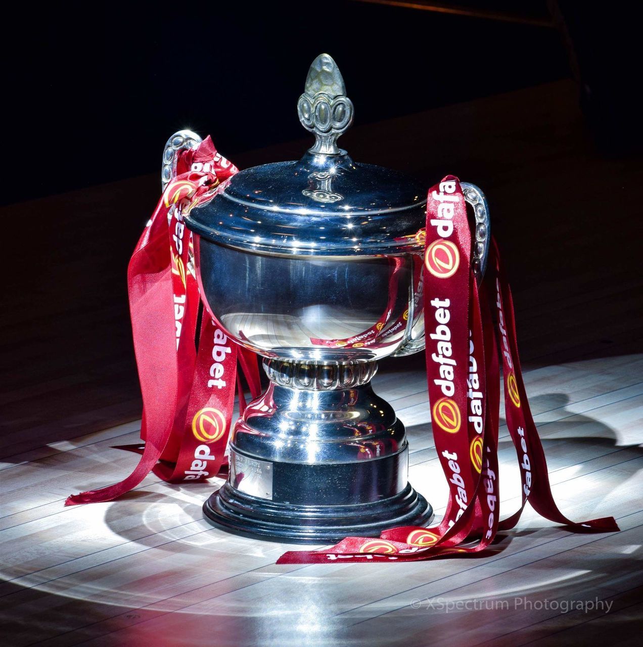 CLOSE-UP OF RED LIGHT ON TABLE