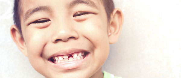 Close-up portrait of smiling boy