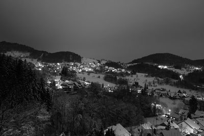 Cityscape with mountain range in background