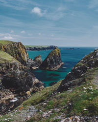 Scenic view of sea against sky at kynance cove in cornwall, england