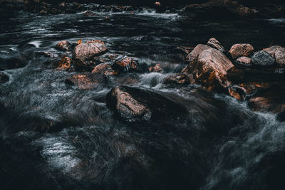 Blurred motion of rocks at sea shore