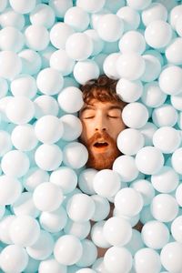 Directly above shot of man with balloons