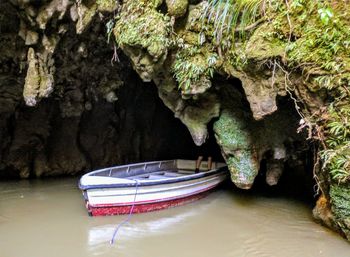 Close-up of boat moored in water