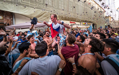 Group of people enjoying in city