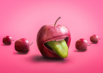 Close-up of fruits against white background