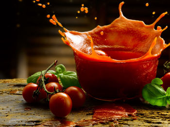 Close-up of cherries on table