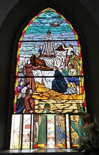 Low angle view of statue on window
