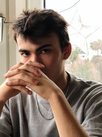 Portrait of young man looking away