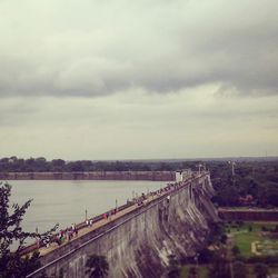 High angle view of bridge against cloudy sky